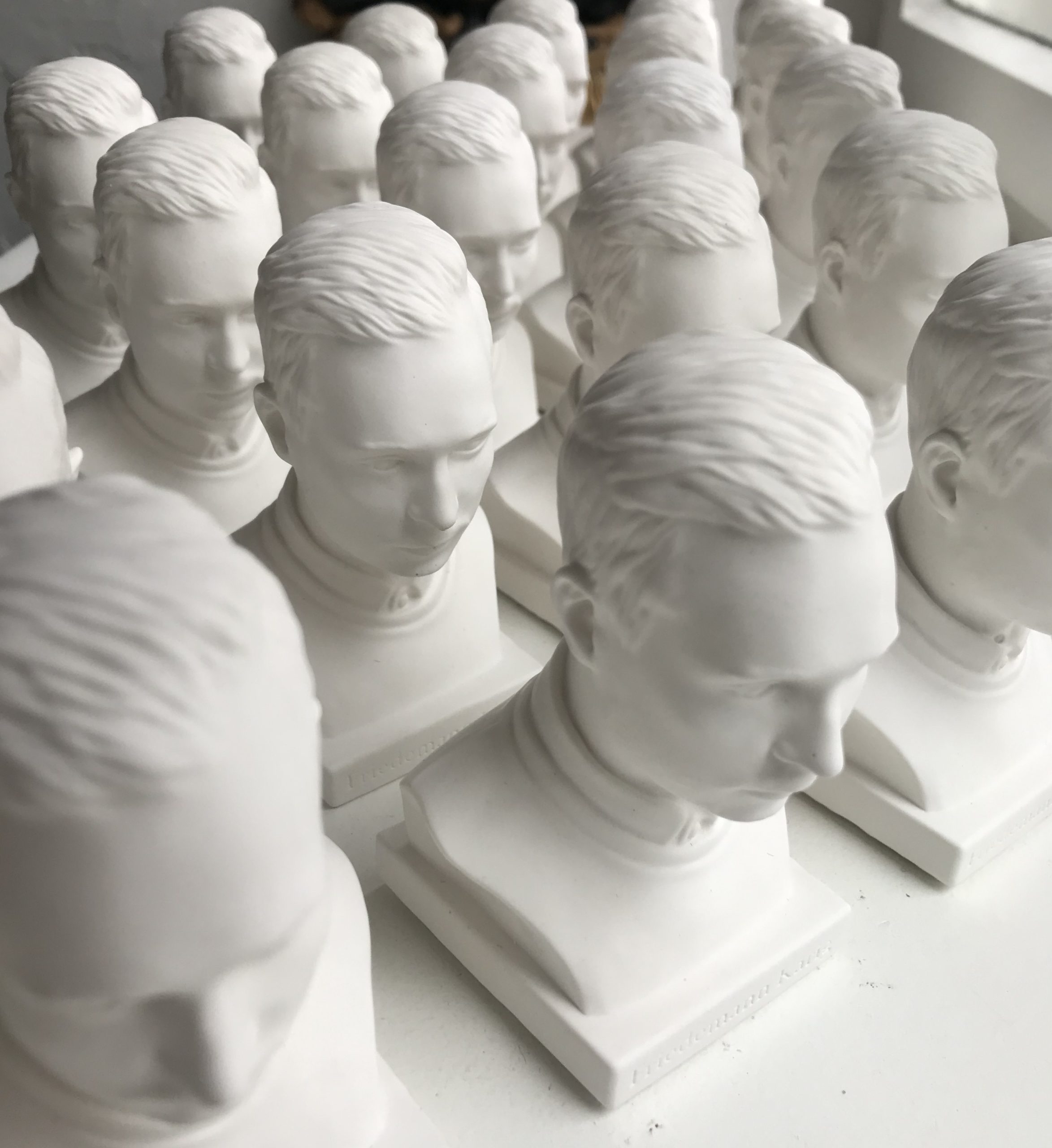 mini plaster busts of Friedemann Karig